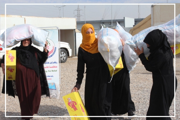 In Al-Khazer camp, Hana organization delivered aid to 752 families